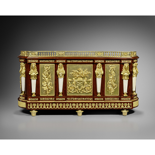 Une jardinière en acajou, marbre blanc