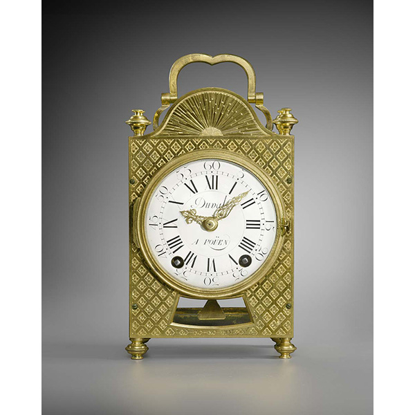 A gilt bronze travel clock