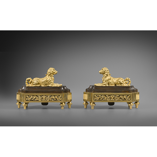 A pair of bronze spaniel chenets